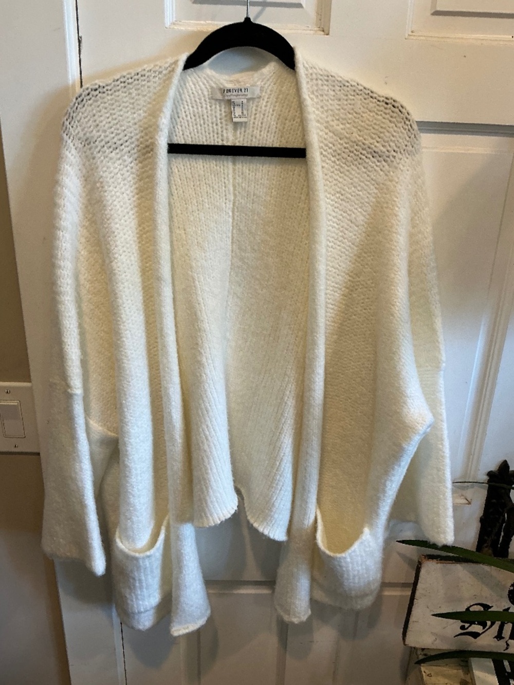 Forever 21 cardigan sweater in a pretty winter white!  Size medium yet oversized
